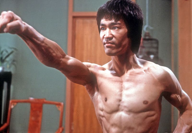 Bruce lee top bicep size