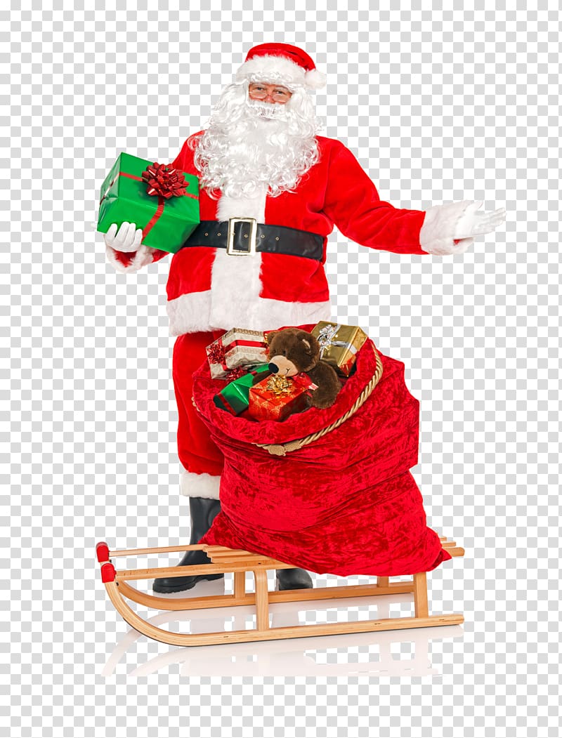 Santa Claus Toy Christmas Gift, Santa Claus with a gift transparent background PNG clipart