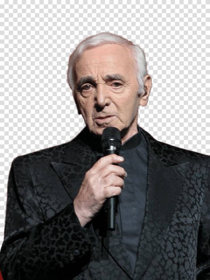 man wearing black peaked lapel suit jacket holding microphone, Charles Aznavour Tuxedo transparent background PNG clipart