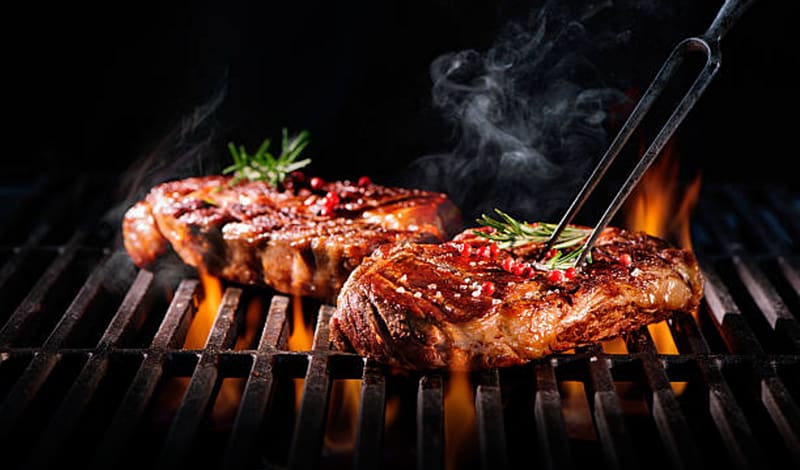 Sizzling flames, Fiery grill ready for some mouthwatering barbecue action  Vertical Mobile Wallpaper AI Generated 30315017 Stock Photo at Vecteezy