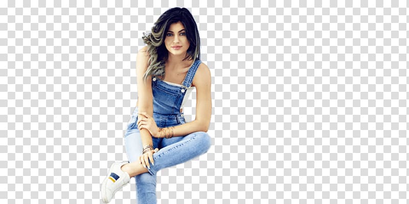 women's blue dungaree pants, Kylie Jenner Sitting Jeans transparent background PNG clipart